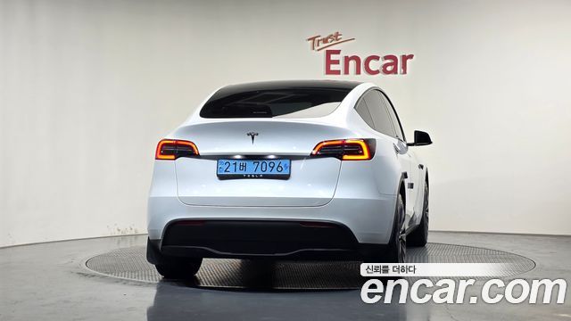 Tesla Model Y 2024 — photo 4