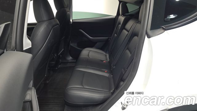 Tesla Model Y 2024 — photo 17
