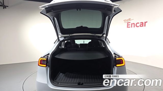 Tesla Model Y 2024 — photo 23