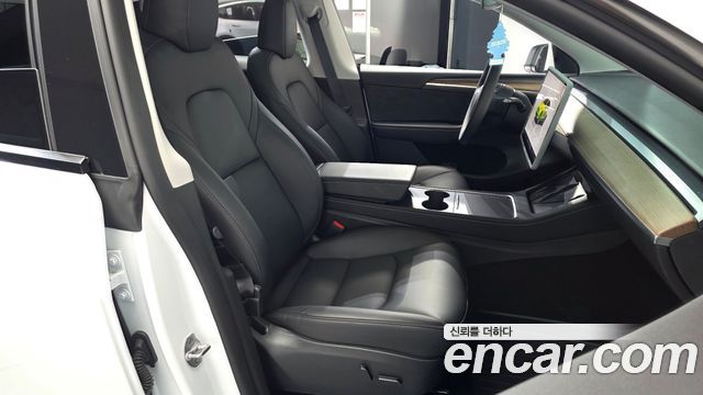 Tesla Model Y 2024 — photo 16