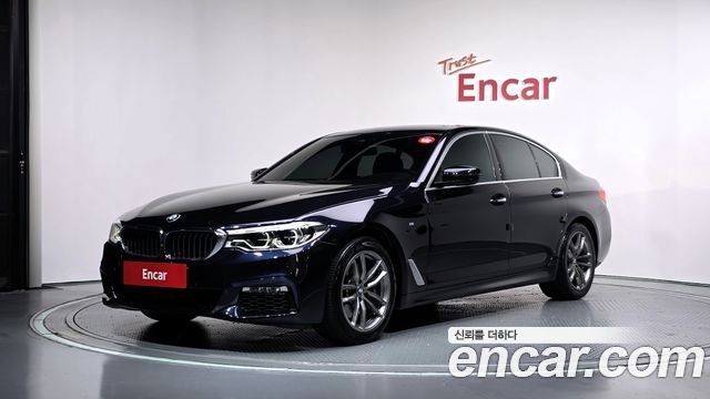 BMW 5-Series 2018 — photo 1
