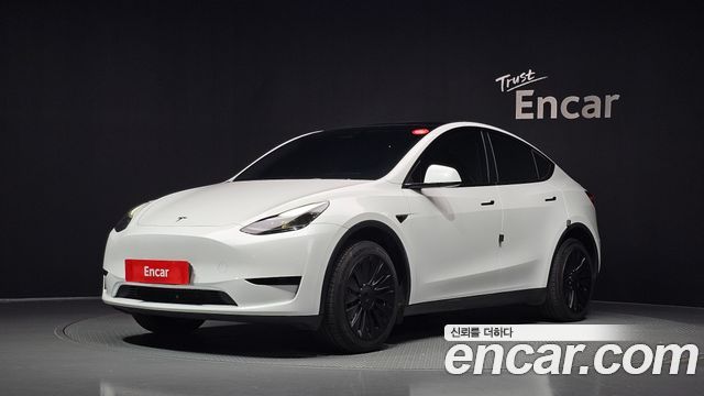 Tesla Model Y 2023 — photo 1