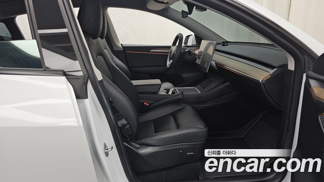 Tesla Model Y 2023 — photo 17
