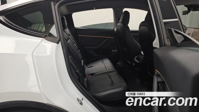 Tesla Model Y 2023 — photo 18