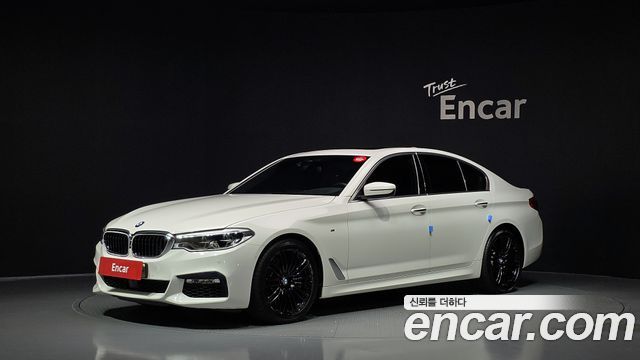 BMW 5-Series 2018 — photo 1