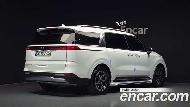 Kia Canival 2021 — photo 2
