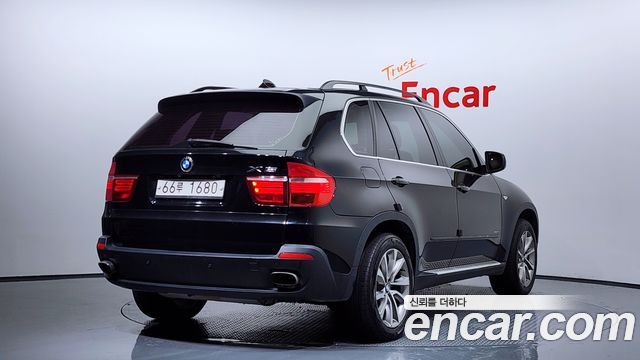 BMW X5 2009 — photo 2