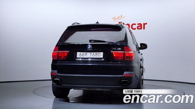 BMW X5 2009 — photo 4