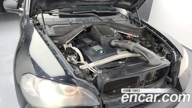 BMW X5 2009 — photo 6