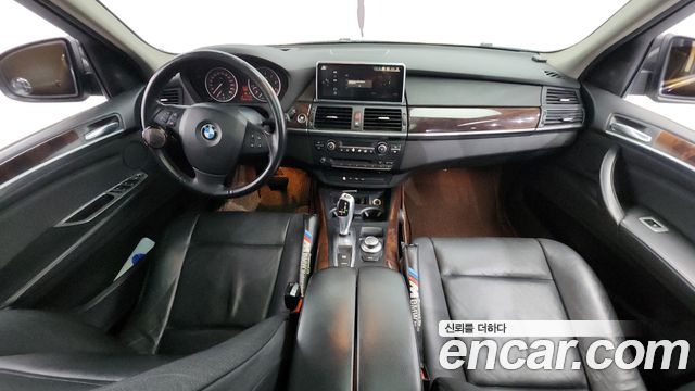 BMW X5 2009 — photo 7