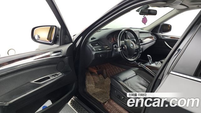 BMW X5 2009 — photo 10
