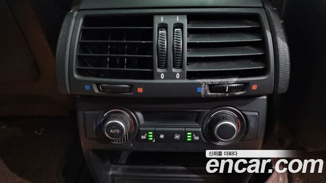BMW X5 2009 — photo 19