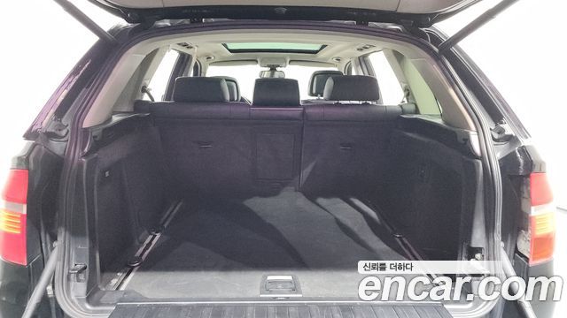 BMW X5 2009 — photo 20