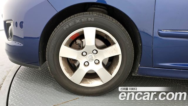 Peugeot 207 2011 — photo 5