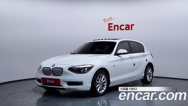 BMW 1-Series 2014 — photo 1