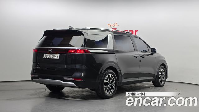 Kia Canival 2021 — photo 2