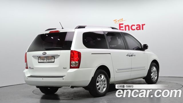 Kia Canival 2013 — photo 2