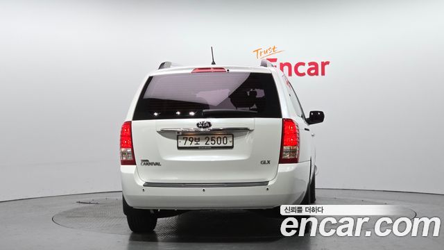 Kia Canival 2013 — photo 4