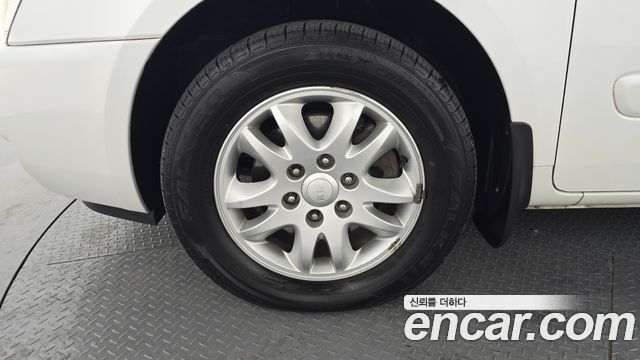 Kia Canival 2013 — photo 5