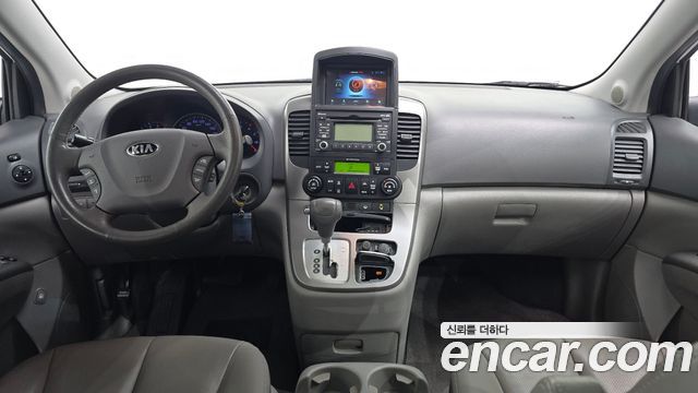Kia Canival 2013 — photo 7