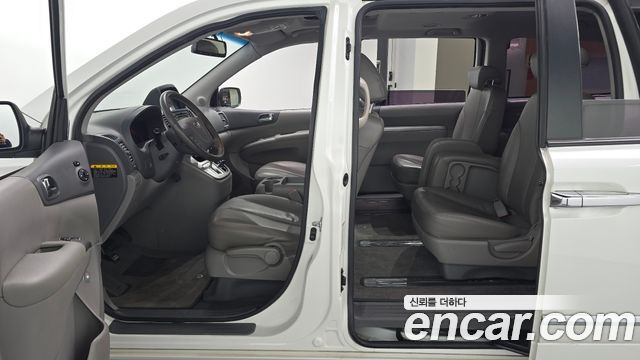 Kia Canival 2013 — photo 10