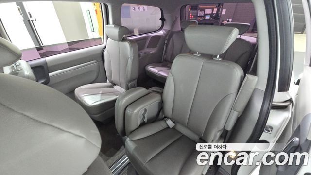 Kia Canival 2013 — photo 12