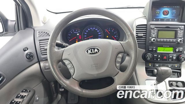 Kia Canival 2013 — photo 13