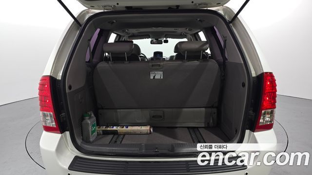 Kia Canival 2013 — photo 20