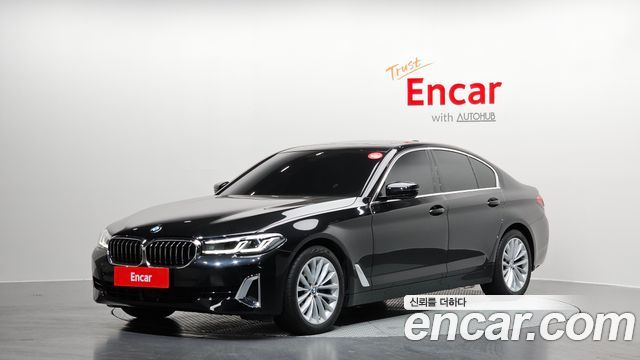 BMW 5-Series 2023 — photo 1