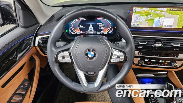 BMW 5-Series 2023 — photo 13