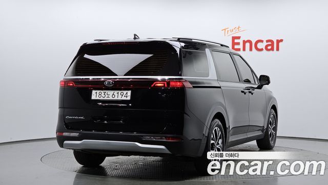 Kia Canival 2021 — photo 2