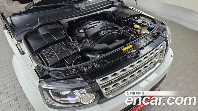 Land Rover Discovery 2014 — photo 6