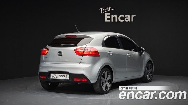 Kia pride 2012 — photo 2