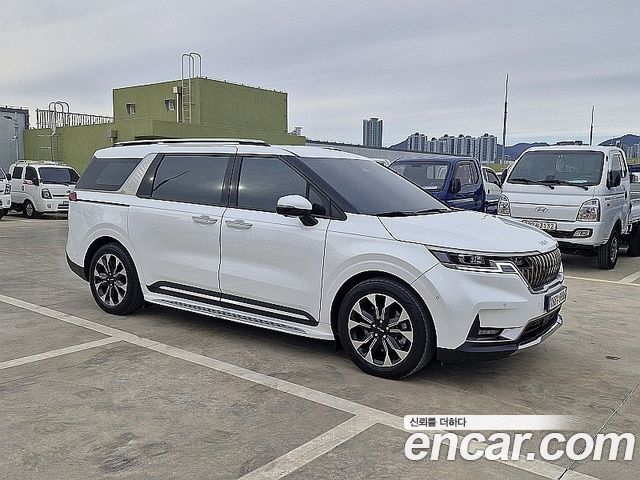 Kia Canival 2023 — photo 2