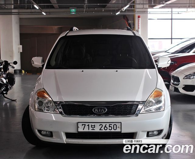 Kia Canival 2012 — photo 3