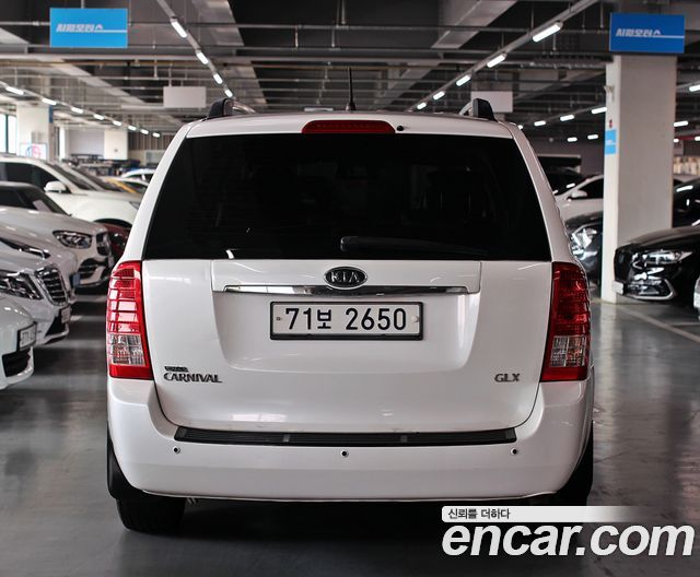 Kia Canival 2012 — photo 4