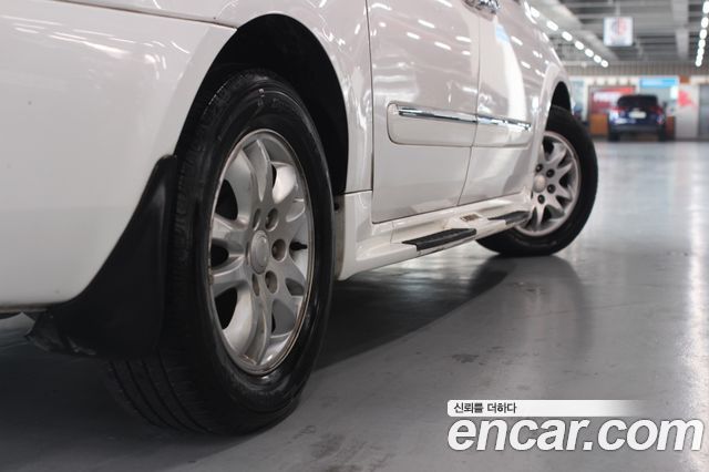 Kia Canival 2012 — photo 5