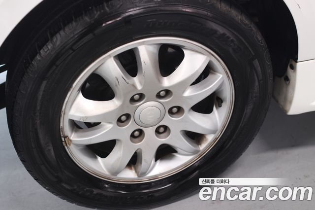 Kia Canival 2012 — photo 6