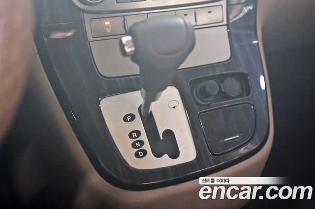 Kia Canival 2012 — photo 9