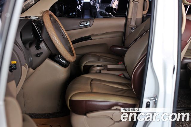 Kia Canival 2012 — photo 10