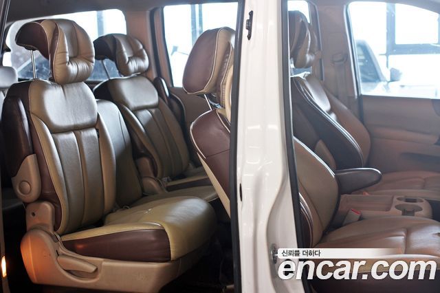 Kia Canival 2012 — photo 13
