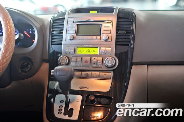 Kia Canival 2012 — photo 14