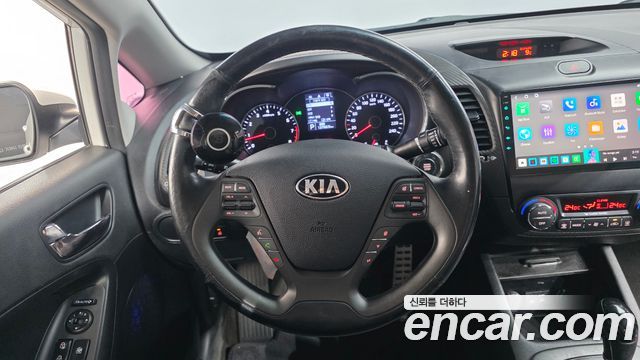 Kia K3 2015 — photo 14