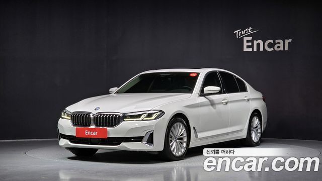BMW 5-Series 2021 — photo 1