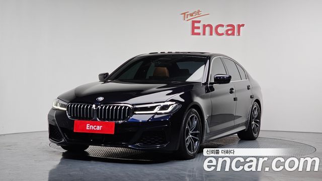 BMW 5-Series 2022 — photo 1
