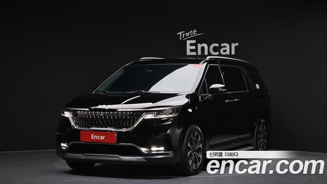 Kia Canival 2023 — photo 1
