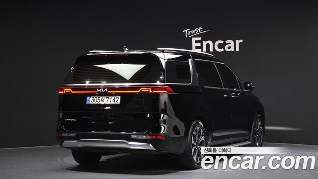 Kia Canival 2023 — photo 2
