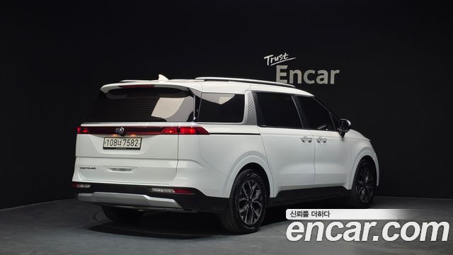 Kia Canival 2021 — photo 2