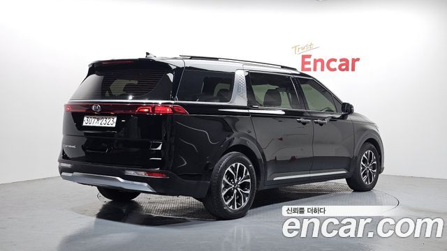 Kia Canival 2021 — photo 2