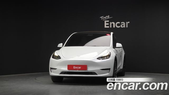 Tesla Model Y 2024 — photo 3